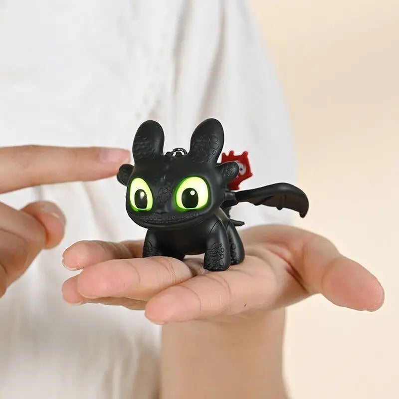 Chaveiro de bebê sem dentes que brilha no escuro com asas móveis, pingente de boneca de pelúcia que brilha, acessório noturno criativo para decoração de bolsa, presente divertido