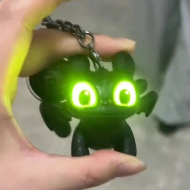 Chaveiro de bebê sem dentes que brilha no escuro com asas móveis, pingente de boneca de pelúcia que brilha, acessório noturno criativo para decoração de bolsa, presente divertido
